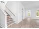 Elegant staircase leading to the second floor at 6051 Stallion Rdg, Douglasville, GA 30135
