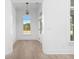 Bright entryway with light flooring and a view of the backyard at 6051 Stallion Rdg, Douglasville, GA 30135