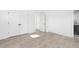 Charming bedroom with hardwood floors and double doors to closet at 6001 Stallion Rdg, Douglasville, GA 30135