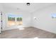 Light-filled bedroom with hardwood floors and two windows at 6001 Stallion Rdg, Douglasville, GA 30135