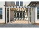 Covered patio with a pergola offering shade and outdoor living space at 6001 Stallion Rdg, Douglasville, GA 30135