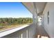 Peaceful balcony with lake and treetop views at 6001 Stallion Rdg, Douglasville, GA 30135