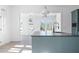 Open concept kitchen with island and view into living area at 6001 Stallion Rdg, Douglasville, GA 30135