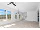 Spacious living area with hardwood floors and multiple windows at 6001 Stallion Rdg, Douglasville, GA 30135