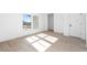 Well-lit bedroom with hardwood floors and a large window at 6001 Stallion Rdg, Douglasville, GA 30135