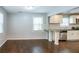 Bright dining room features hardwood floors and an open concept design with kitchen access at 2836 Harlan Dr, Atlanta, GA 30344
