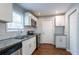 Renovated kitchen, featuring granite countertops and new appliances at 2836 Harlan Dr, Atlanta, GA 30344