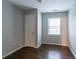 Simple bedroom with hardwood floors and a closet at 2836 Harlan Dr, Atlanta, GA 30344