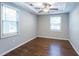 Spacious bedroom with hardwood floors and two windows at 2836 Harlan Dr, Atlanta, GA 30344