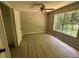 Spacious bedroom with large window and ceiling fan at 435 Ridgedale Way, Lawrenceville, GA 30044