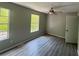 Spacious bedroom with new flooring and dual windows at 435 Ridgedale Way, Lawrenceville, GA 30044