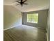 Spacious bedroom with vaulted ceiling and large window at 435 Ridgedale Way, Lawrenceville, GA 30044