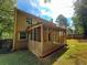 Back exterior of house with screened porch at 435 Ridgedale Way, Lawrenceville, GA 30044