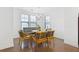 Charming dining area with hardwood floors and a round wooden table at 2632 Caruso Way, Atlanta, GA 30339