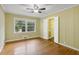 Spacious bedroom with hardwood floors and access to hallway at 2347 Lavista Ne Rd, Atlanta, GA 30329