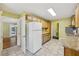 Open kitchen with granite countertops and wood cabinets at 2347 Lavista Ne Rd, Atlanta, GA 30329