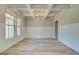 Elegant dining room featuring a coffered ceiling and chandelier at 201 Haverling Pass, Hampton, GA 30252