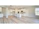 Modern kitchen with white cabinets and island at 201 Haverling Pass, Hampton, GA 30252