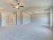 Spacious main bedroom with tray ceiling and ample natural light at 201 Haverling Pass, Hampton, GA 30252