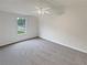 Spacious bedroom with carpet and a ceiling fan at 9105 Sterling Lakes Cir, Covington, GA 30014