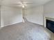 Living Room with fireplace and stairs at 9105 Sterling Lakes Cir, Covington, GA 30014