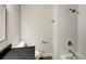 Contemporary bathroom boasts a white subway tile shower and dark vanity at 3624 Nessa Se Ct, Smyrna, GA 30082