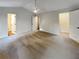Large main bedroom with plush carpeting and access to additional rooms at 3624 Nessa Se Ct, Smyrna, GA 30082