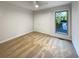 Spacious bedroom with neutral walls, plush carpeting, and a double-door closet at 3624 Nessa Se Ct, Smyrna, GA 30082