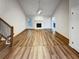 Spacious living area with hardwood floors and fireplace at 3624 Nessa Se Ct, Smyrna, GA 30082