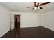 Finished basement bedroom with two doors and dark flooring at 110 Mountain Laurel Ct, Canton, GA 30114