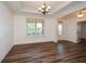 Bright dining room with hardwood floors and window with shutters at 110 Mountain Laurel Ct, Canton, GA 30114