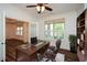 Spacious home office with built-in shelving and hardwood floors at 110 Mountain Laurel Ct, Canton, GA 30114