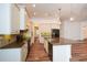 Modern kitchen with granite island and stainless steel appliances at 110 Mountain Laurel Ct, Canton, GA 30114