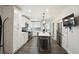 Modern kitchen with white cabinets, stainless steel appliances, and an island at 618 Daniel Se Ave, Decatur, GA 30032