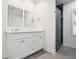 Elegant bathroom with double vanity, frameless shower, and modern fixtures at 618 Daniel Se Ave, Decatur, GA 30032