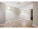 Finished basement with light colored flooring at 1486 Willow Bnd, Woodstock, GA 30188
