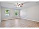 Bright bedroom with neutral walls and wood flooring at 1486 Willow Bnd, Woodstock, GA 30188