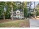 Two story house with front porch at 1486 Willow Bnd, Woodstock, GA 30188