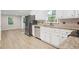 Kitchen with granite countertops and stainless steel appliances at 1486 Willow Bnd, Woodstock, GA 30188