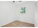 Simple bedroom with neutral walls and wood flooring at 1486 Willow Bnd, Woodstock, GA 30188