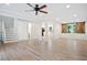 Spacious living room with hardwood floors and open concept at 1486 Willow Bnd, Woodstock, GA 30188
