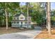 Charming two-story home with wraparound porch at 1486 Willow Bnd, Woodstock, GA 30188