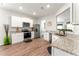 Modern kitchen with granite countertops and stainless steel appliances at 426 Samara Ct, Fairburn, GA 30213