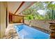 Inviting in-ground pool with flagstone patio at 5005 Jones Rd, Fairburn, GA 30213