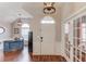 Hardwood floor entryway with interior office and French doors at 2677 Gold Rust Dr, Buford, GA 30519