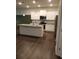 Modern kitchen with white cabinets, granite countertops, and stainless steel appliances at 7298 Rockhouse Rd # 5, Austell, GA 30168