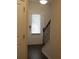 Entryway with front door, staircase, and hardwood floors at 7298 Rockhouse Rd # 5, Austell, GA 30168