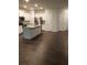 Modern kitchen with white cabinets and island at 7298 Rockhouse Rd # 5, Austell, GA 30168