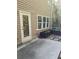Private backyard patio with raised garden beds at 7298 Rockhouse Rd # 5, Austell, GA 30168