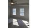 Bright and spacious main bedroom with carpet flooring at 7298 Rockhouse Rd # 5, Austell, GA 30168